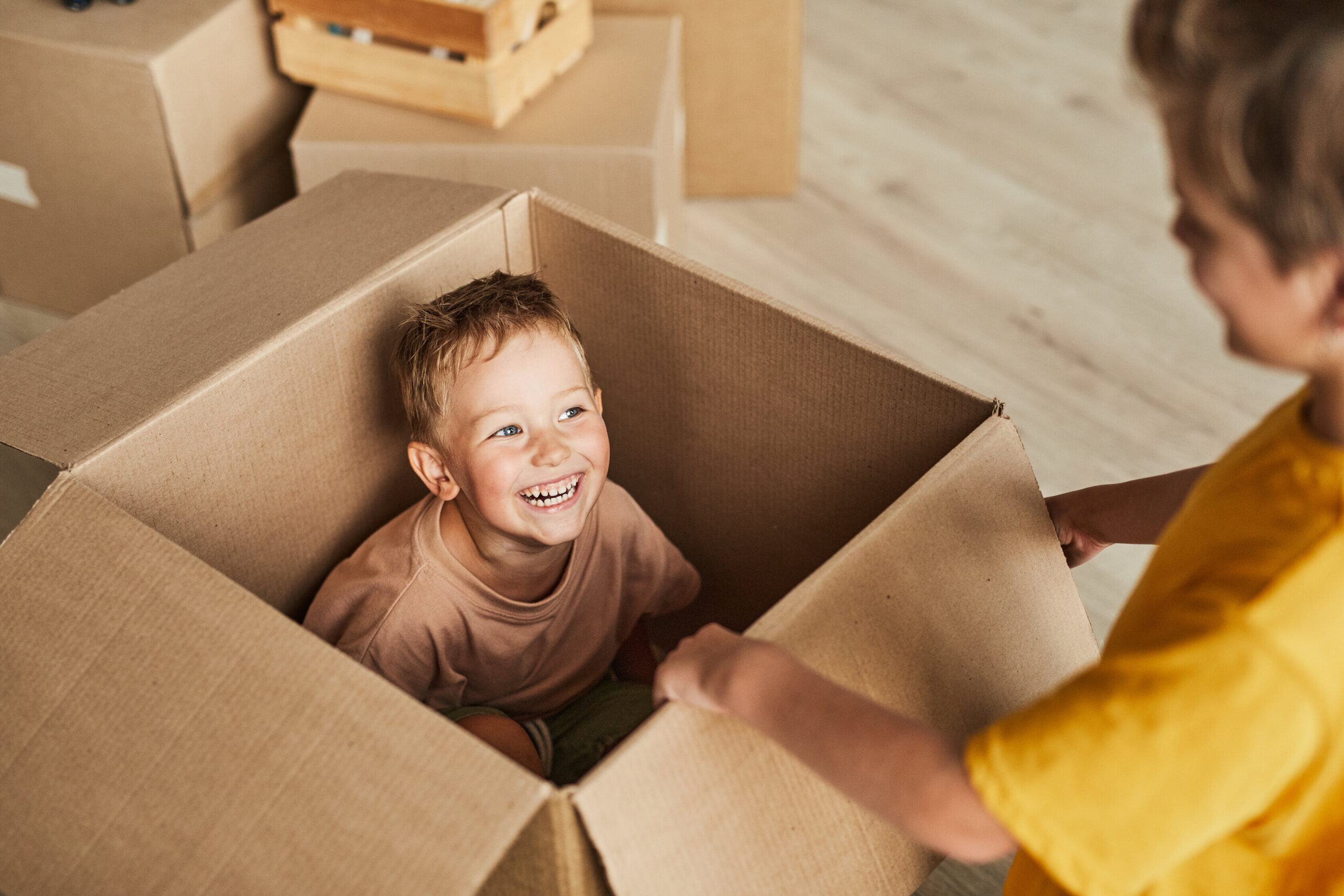 kids with moving boxes